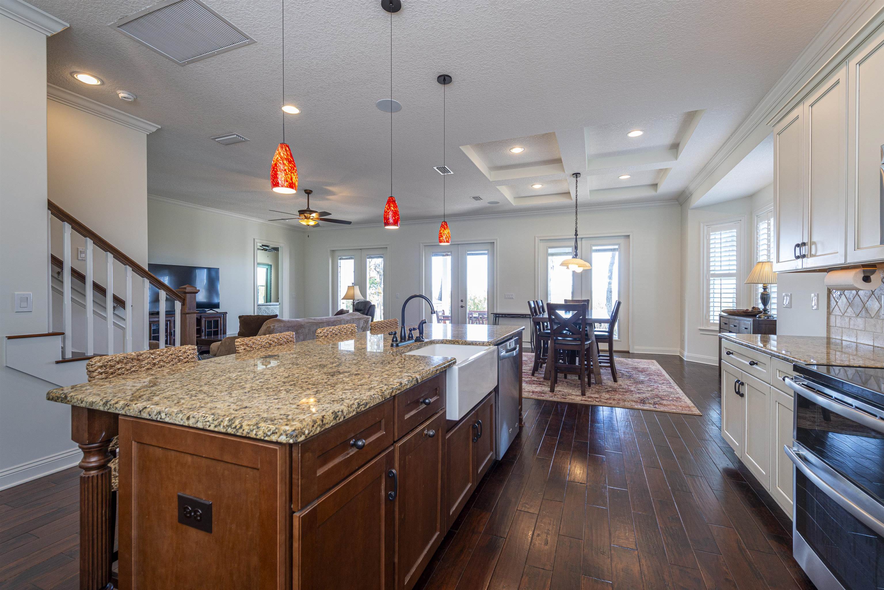 5475 Riverwood Road North St. Augustine, FL 32092 - Photo 12 of 62 Kitchen with a kitchen bar, light stone countertops, pendant lighting, recessed lighting, and appliances with stainless steel finishes