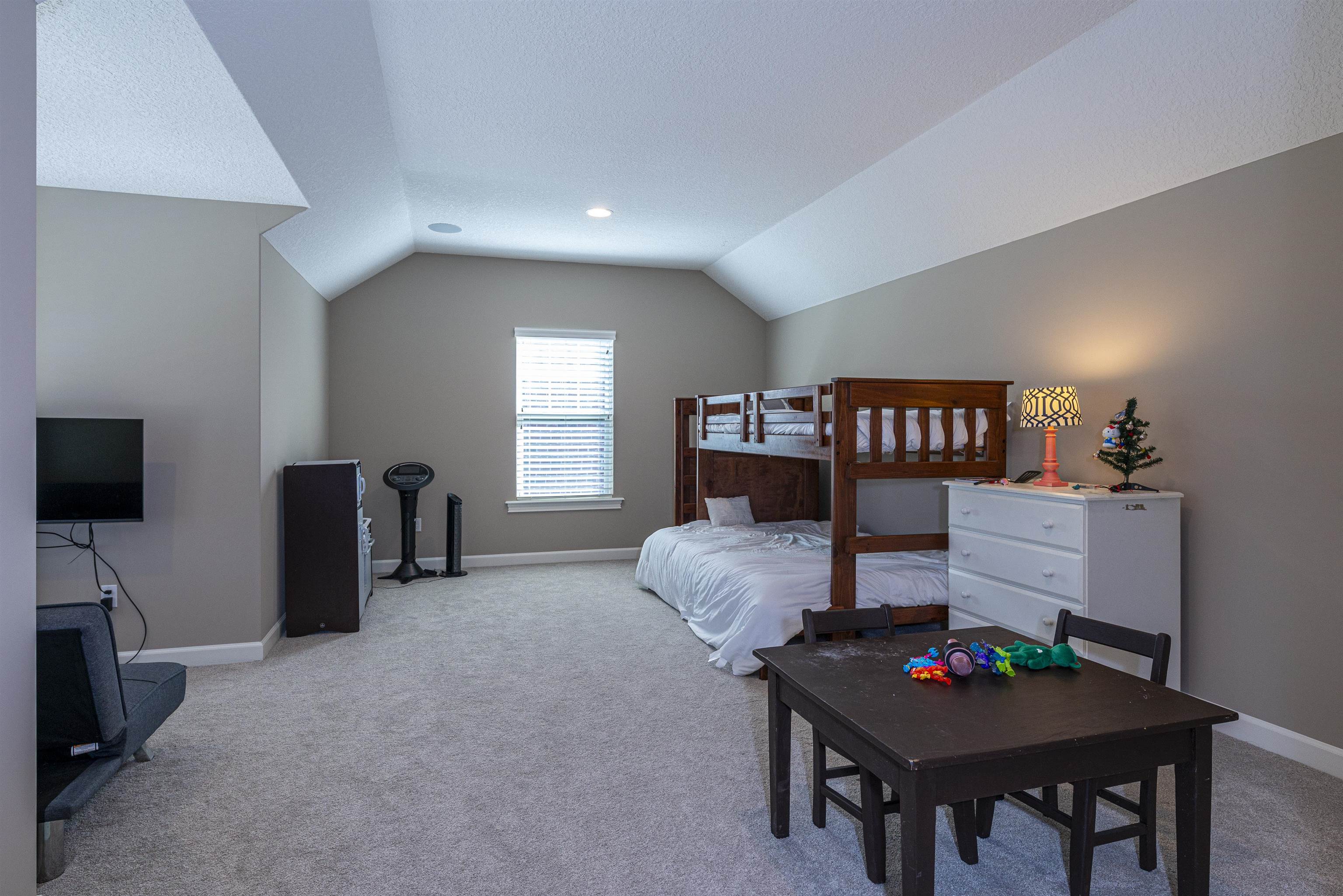 5475 Riverwood Road North St. Augustine, FL 32092 - Photo 30 of 62 Bedroom featuring vaulted ceiling and light carpet