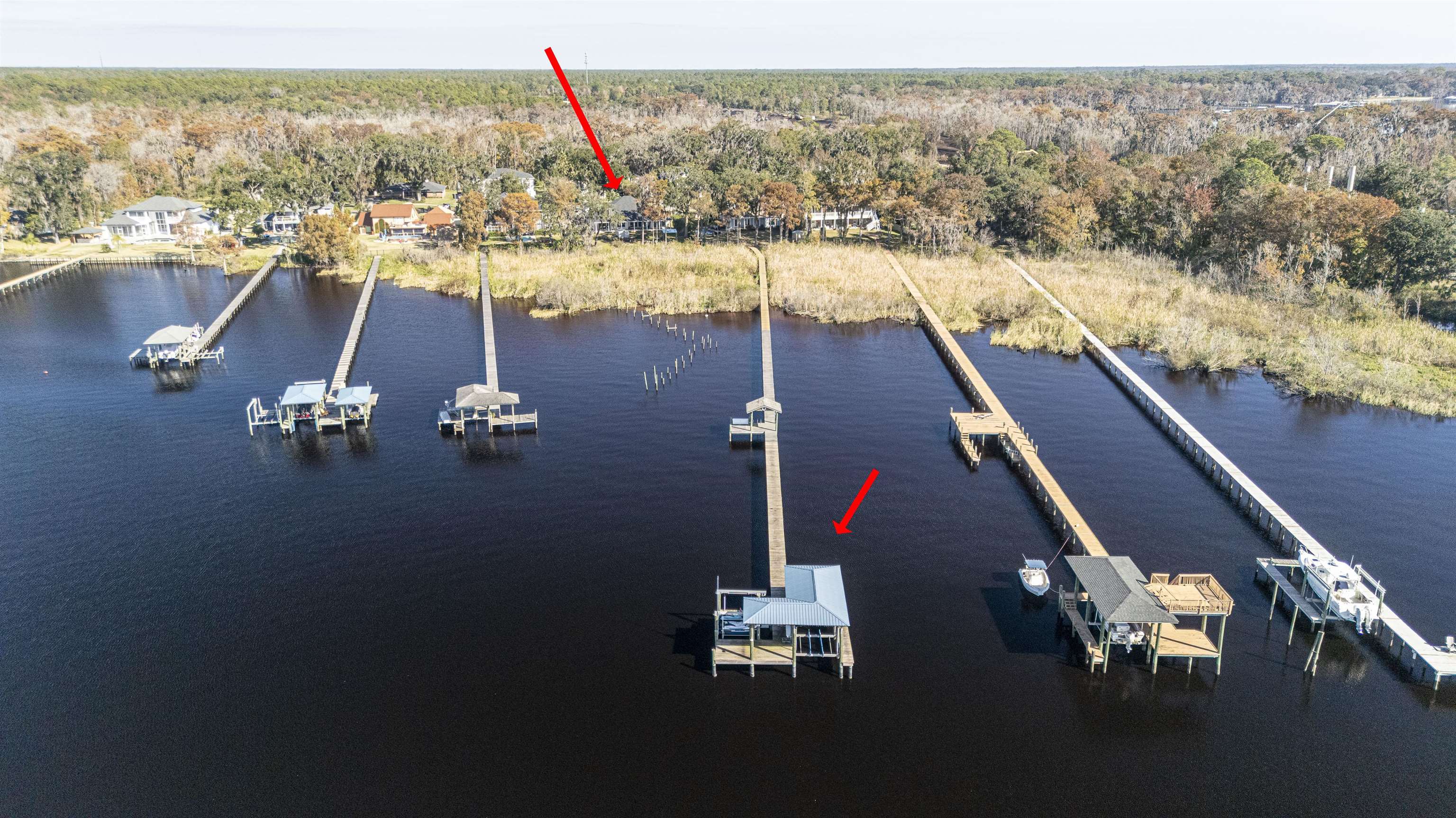 5475 Riverwood Road North St. Augustine, FL 32092 - Photo 35 of 62 Dock with a water view and boat lift