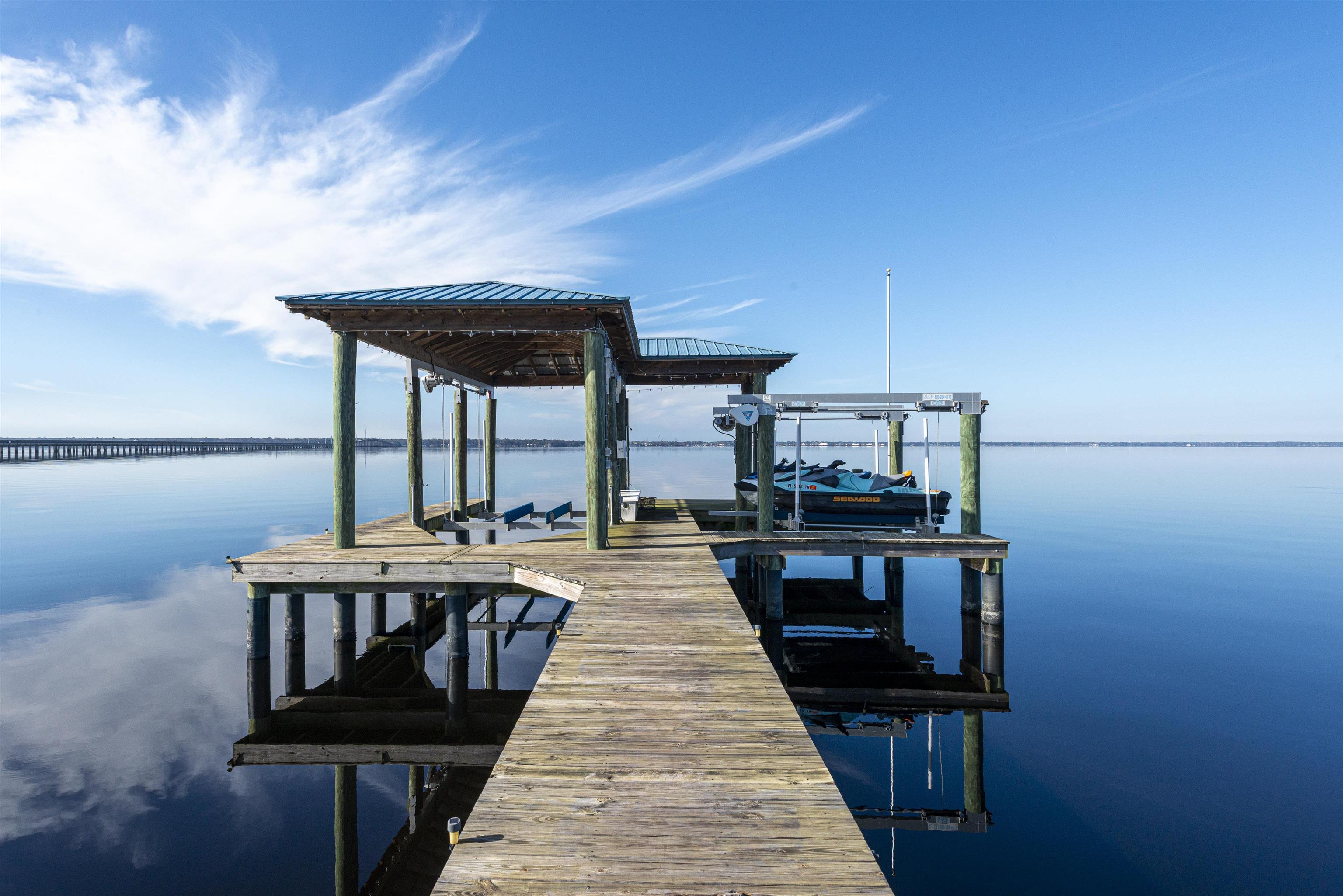 5475 Riverwood Road North St. Augustine, FL 32092 - Photo 41 of 62 Dock with boat lift and a water view