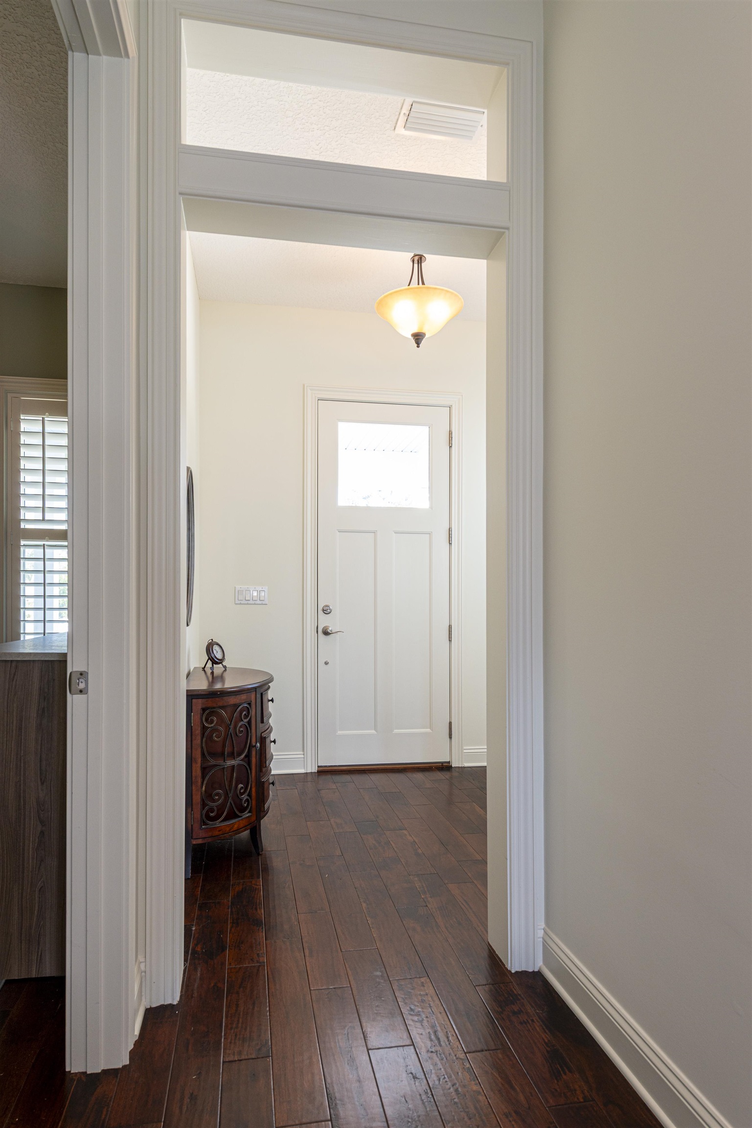 5475 Riverwood Road North St. Augustine, FL 32092 - Photo 48 of 62 Entrance foyer featuring dark wood-style floors and baseboards