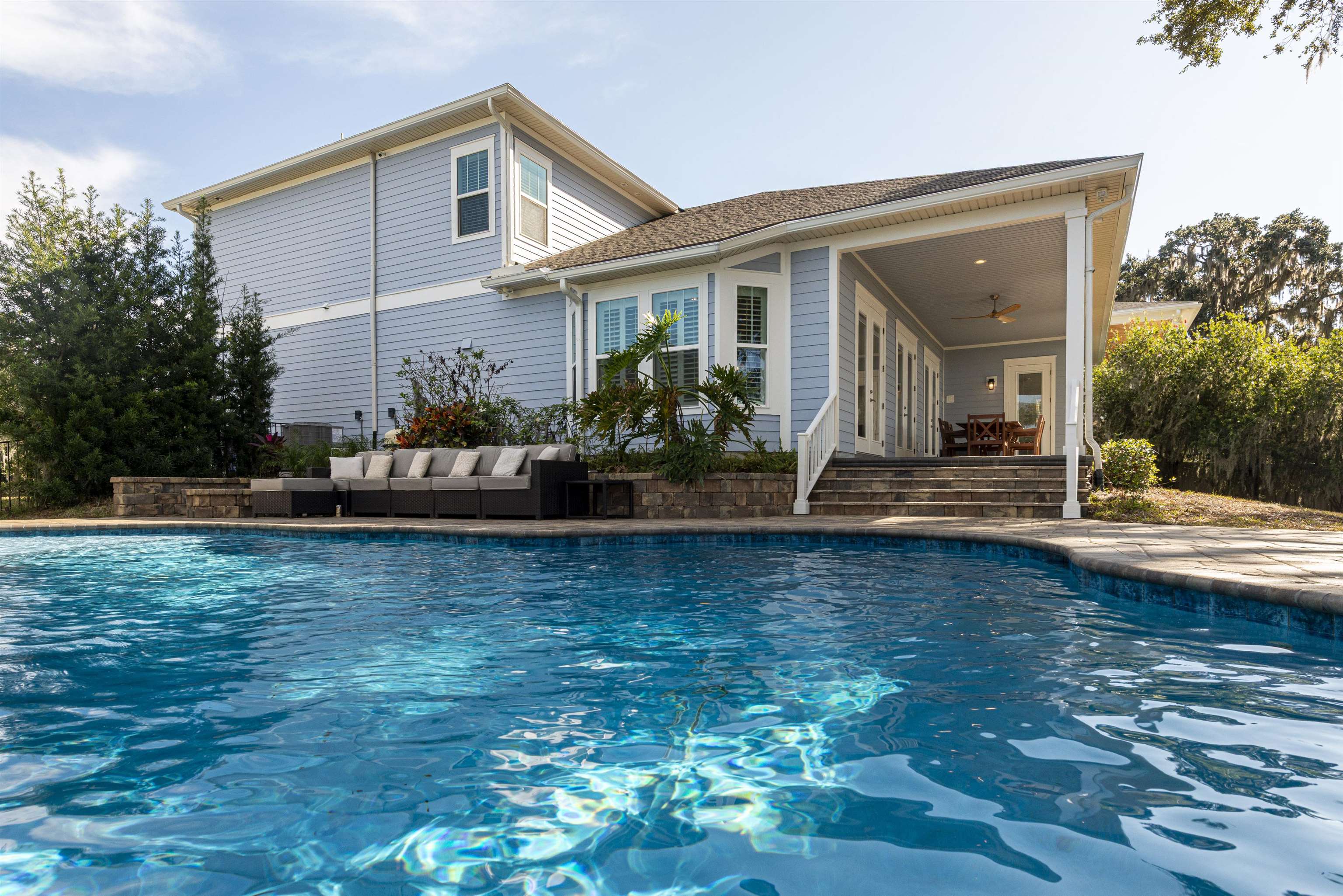 5475 Riverwood Road North St. Augustine, FL 32092 - Photo 56 of 62 Outdoor pool featuring an outdoor living space and a patio