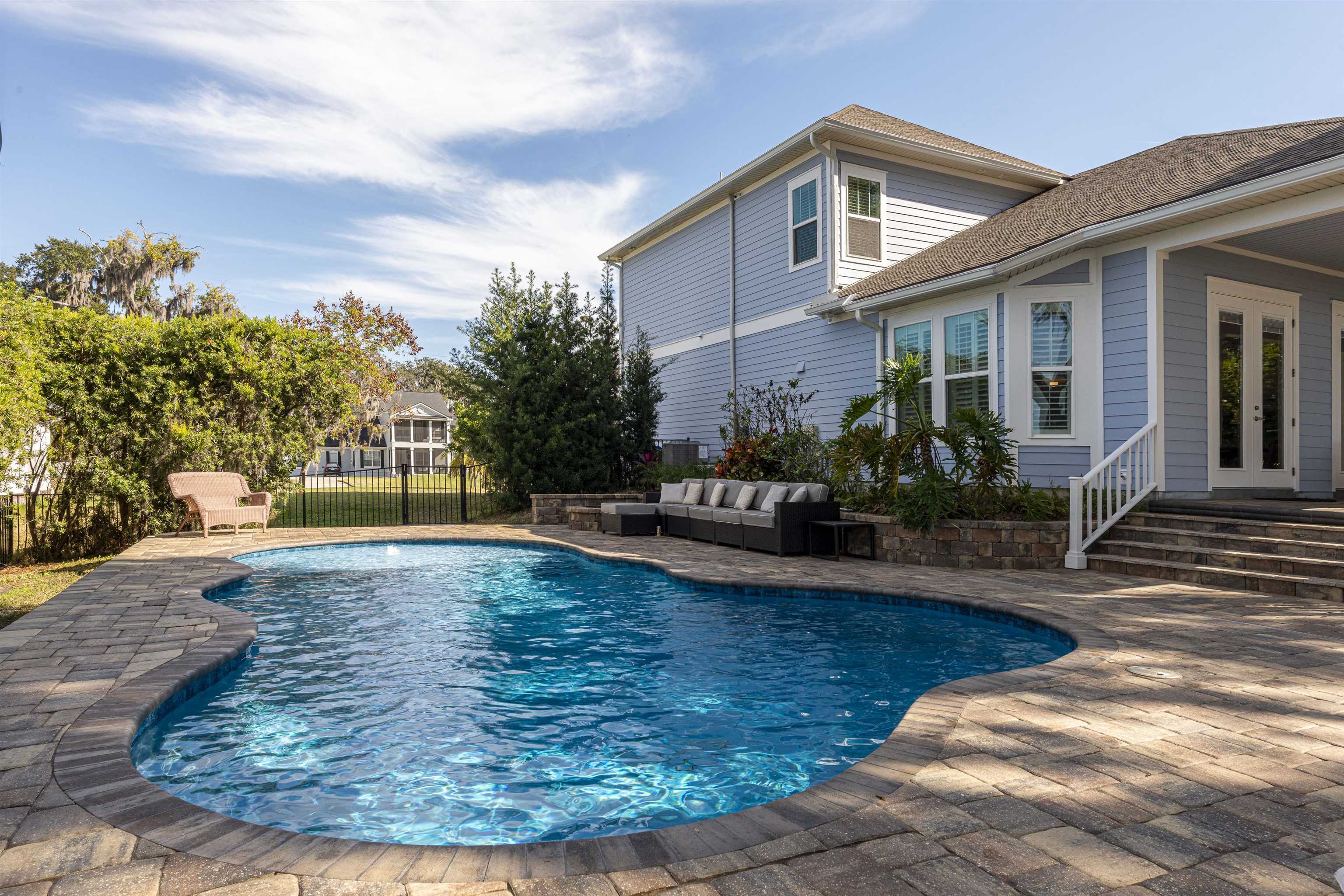 5475 Riverwood Road North St. Augustine, FL 32092 - Photo 57 of 62 View of pool featuring a patio area, french doors, and an outdoor hangout area
