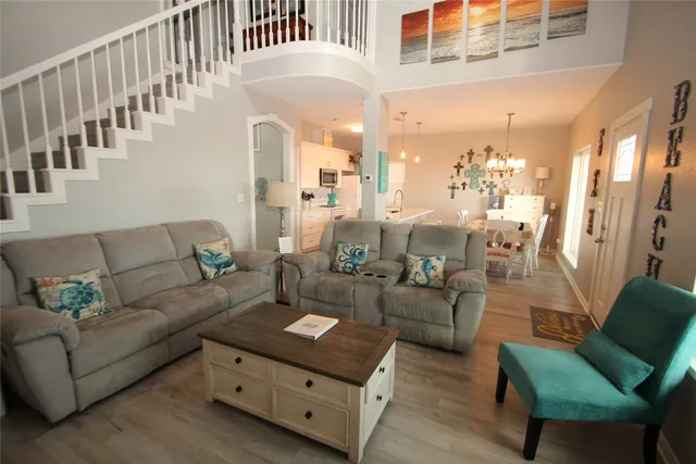 a kitchen with a refrigerator a stove top oven a sink and dishwasher