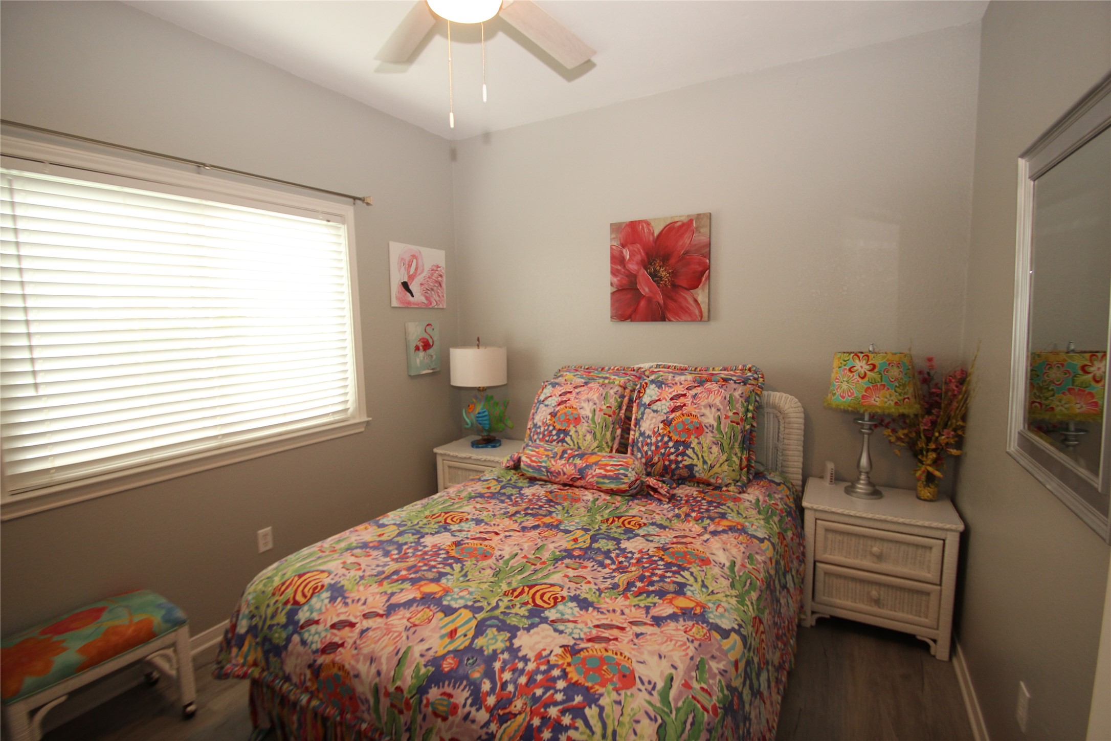 1648 Sandpebble Place Surfside Beach, TX 77541 - Photo 25 of 50 a bedroom with a bed and a window