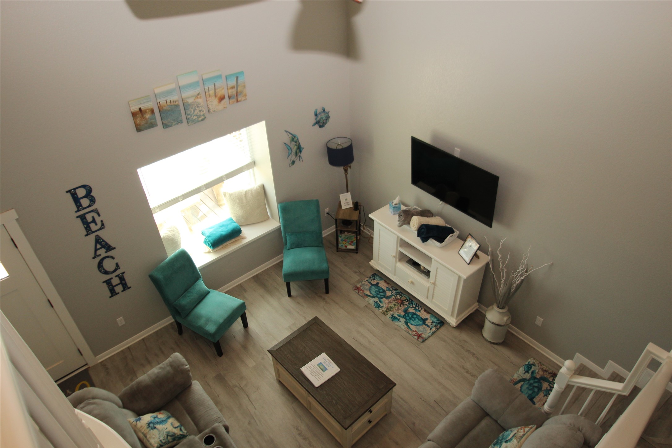 1648 Sandpebble Place Surfside Beach, TX 77541 - Photo 31 of 50 a living room with furniture and a flat screen tv
