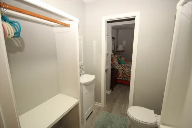 a view of a porch with a table and chairs