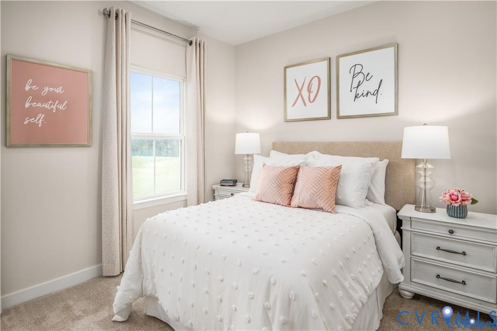 12743 Red Clover Way Midlothian, VA 23112 - Photo 18 of 26 a bedroom with a bed and a window