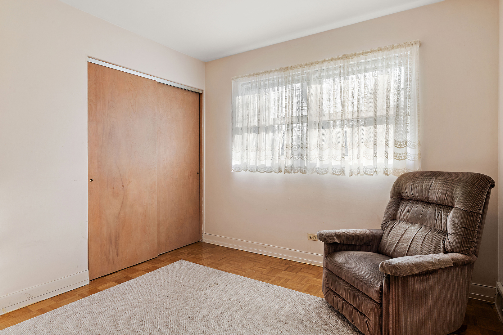 103 South Maple Lane Prospect Heights, IL 60070 - Photo 12 of 17 a living room with furniture and a window