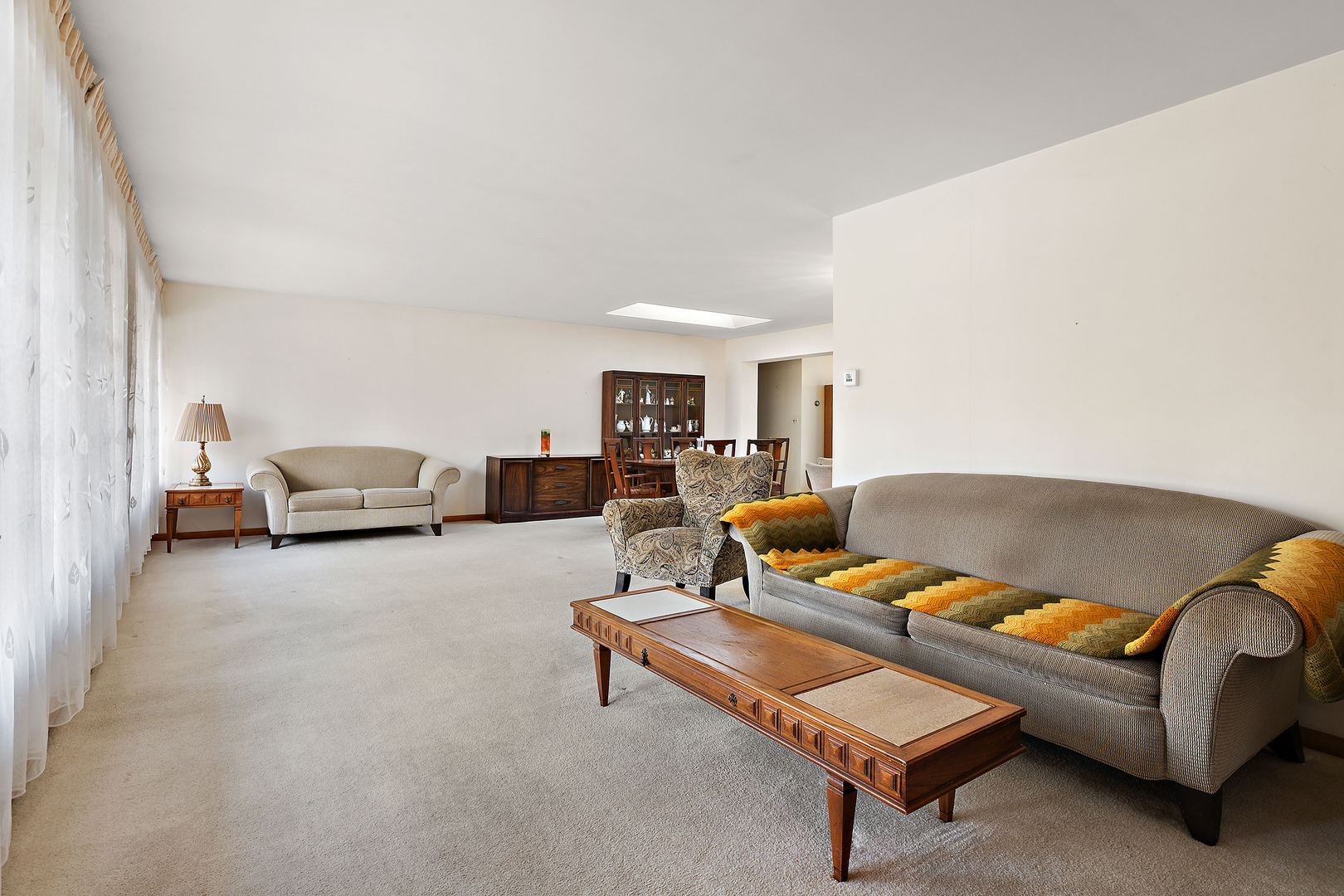 103 South Maple Lane Prospect Heights, IL 60070 - Photo 4 of 17 a living room with furniture and a couch