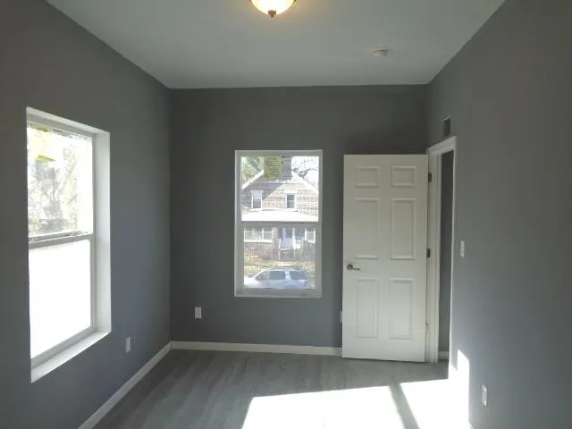 an empty room with windows