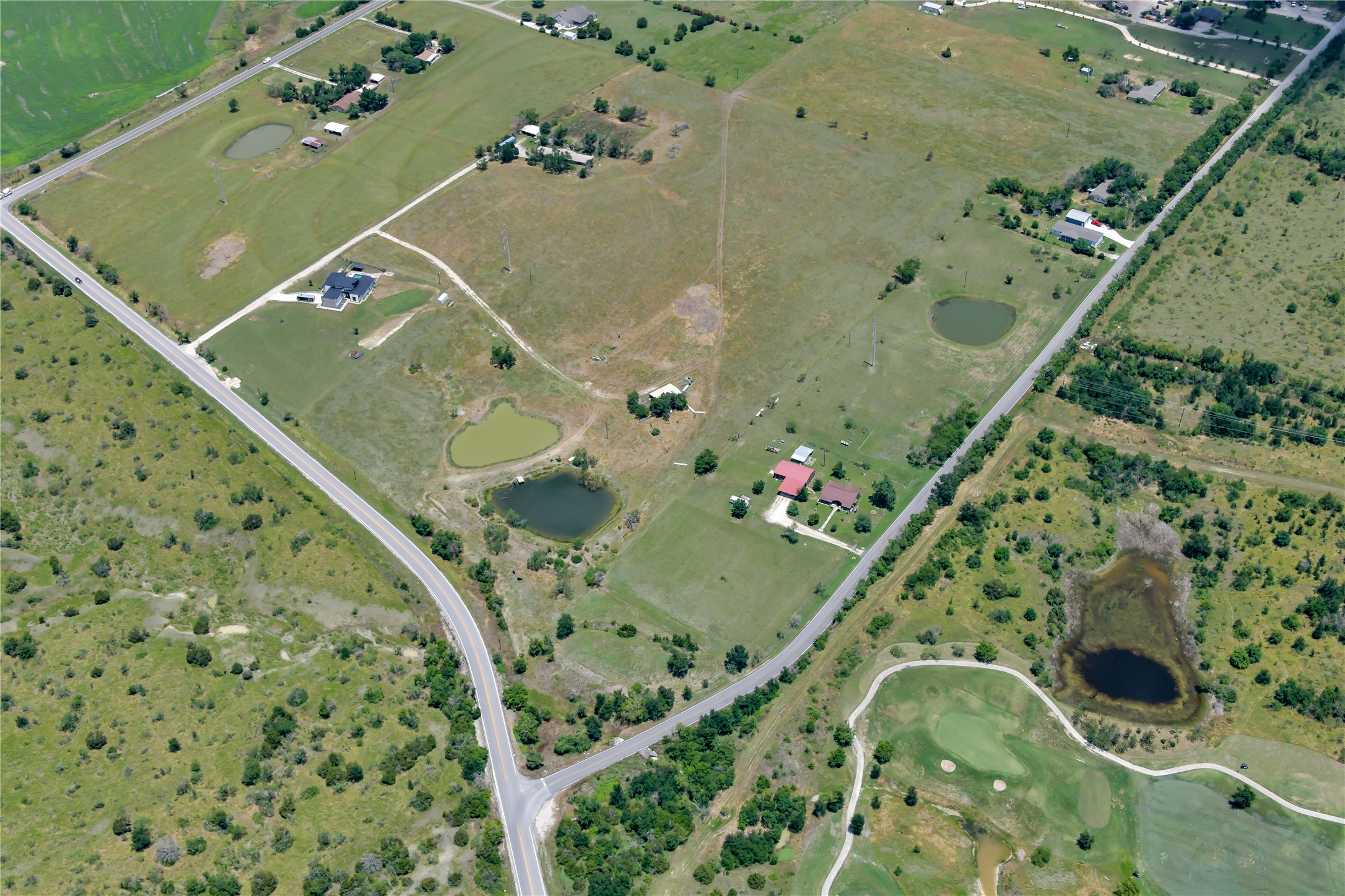 13245 Gregg Manor Road Manor, TX 78653 - Photo 11 of 12 an aerial view of a swimming pool