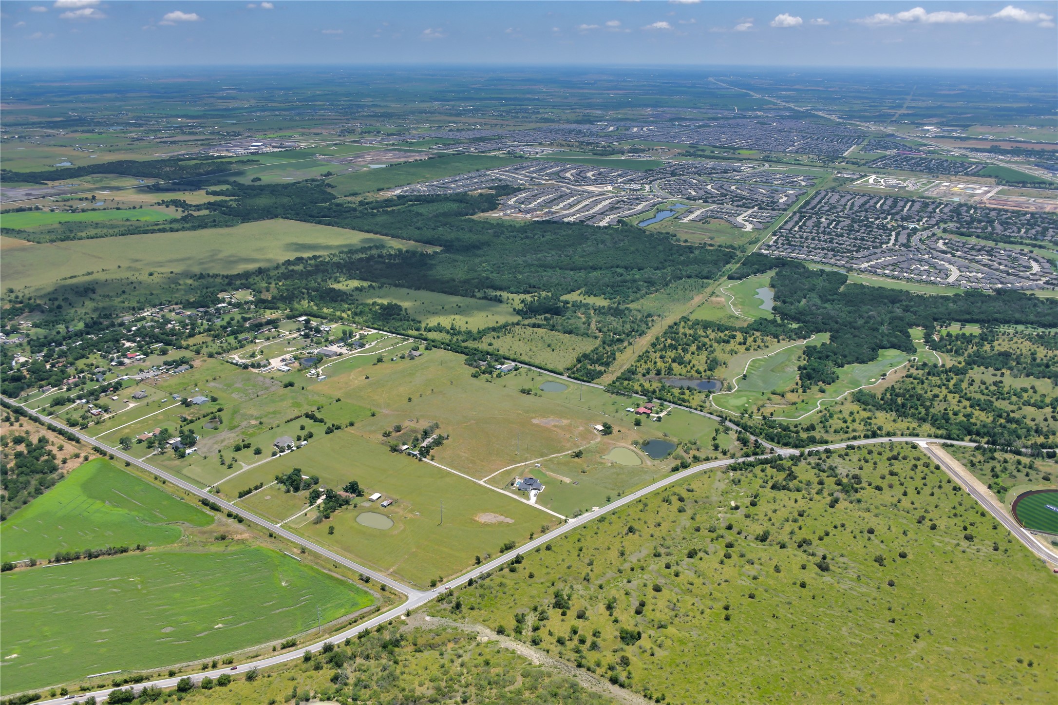 13245 Gregg Manor Road Manor, TX 78653 - Photo 5 of 12 a view of an ocean and beach