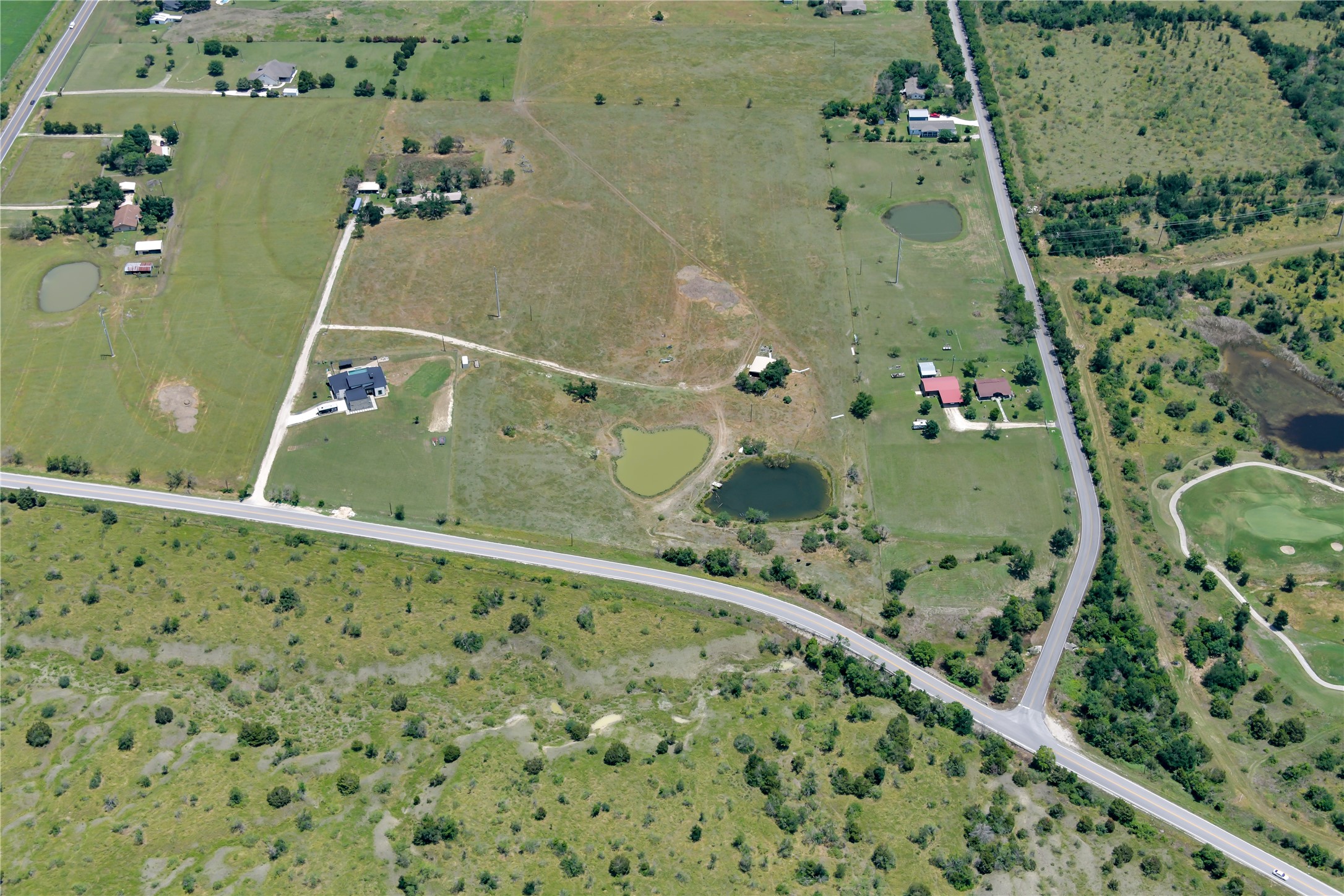 13245 Gregg Manor Road Manor, TX 78653 - Photo 10 of 12 an aerial view of a swimming pool