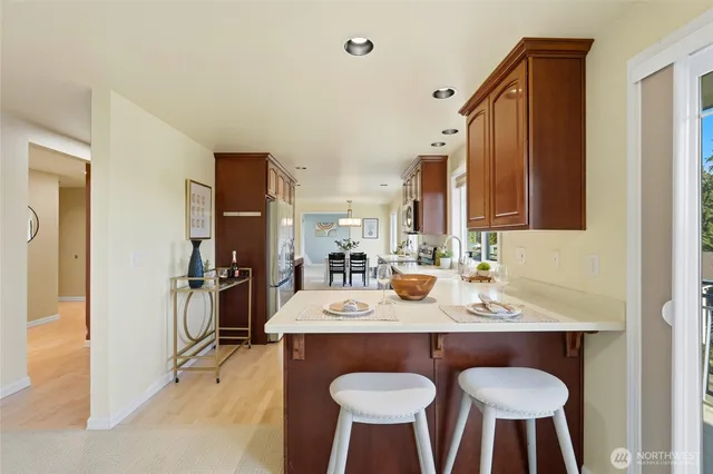 a view of kitchen island dining table and chairs