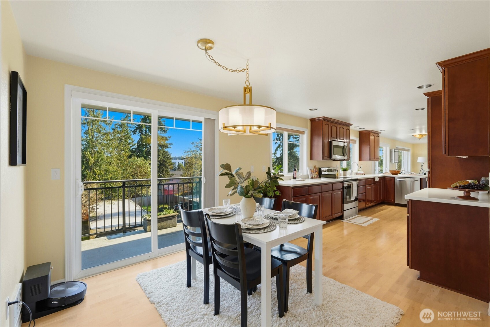7503 212th Street Southwest, Unit B302 Edmonds, WA 98026 - Photo 17 of 28 a view of a dining room with furniture window and outside view