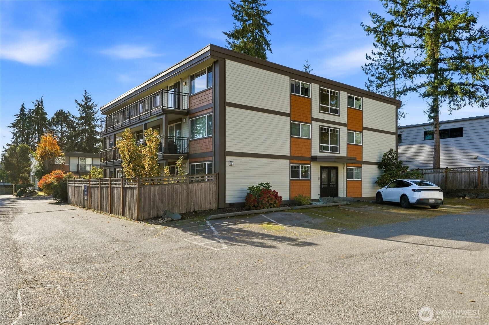 7503 212th Street Southwest, Unit B302 Edmonds, WA 98026 - Photo 3 of 28 a front view of a house with a yard