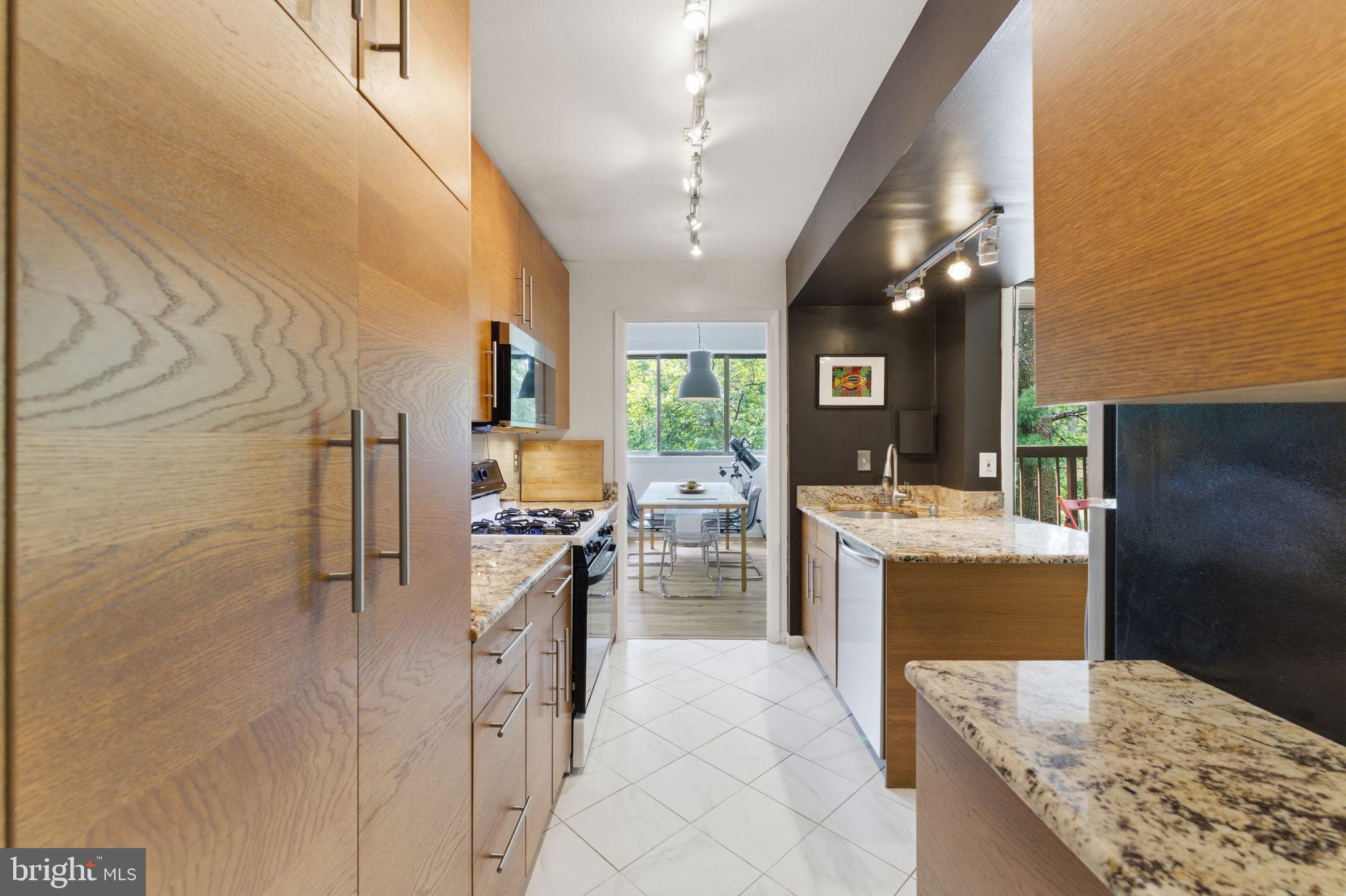 11260 Chestnut Grove Square, Unit 337 Reston, VA 20190 - Photo 20 of 82 Modern kitchen with sleek finishes.
