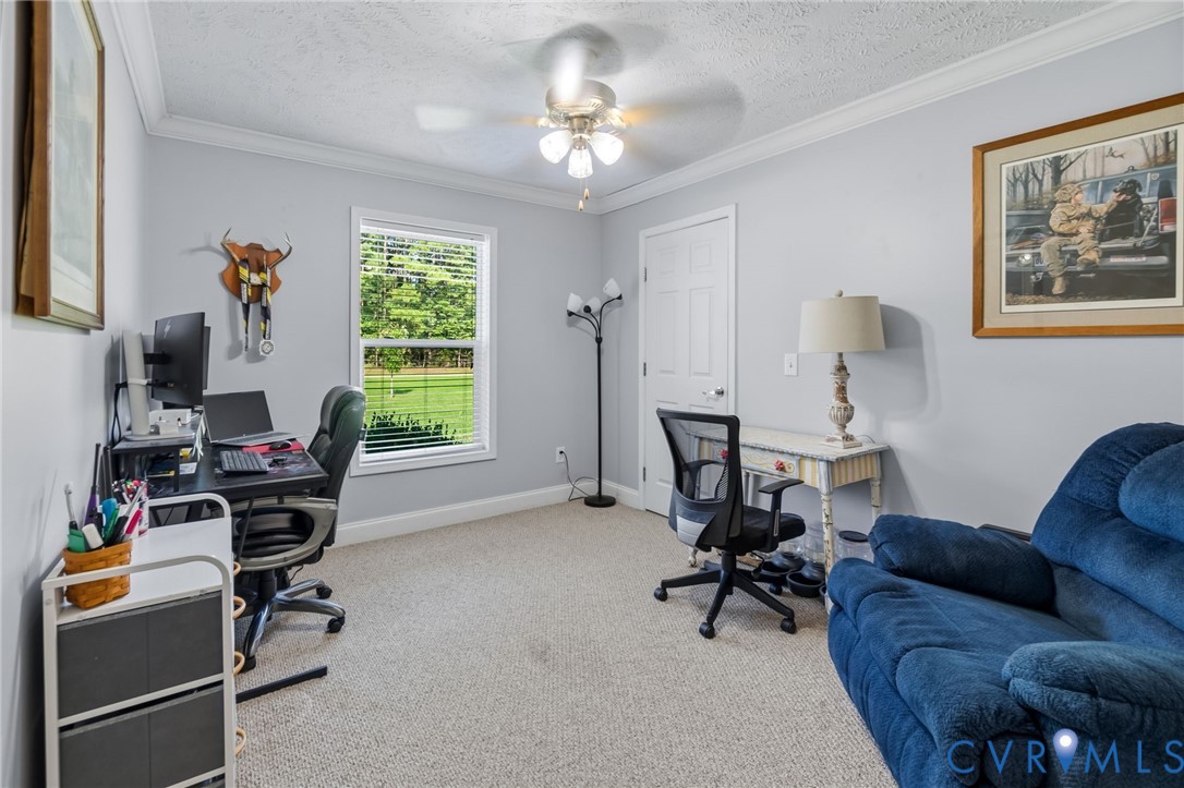 10910 Courthouse Road Dinwiddie, VA 23841 - Photo 26 of 38 Interior space featuring crown molding, a window w