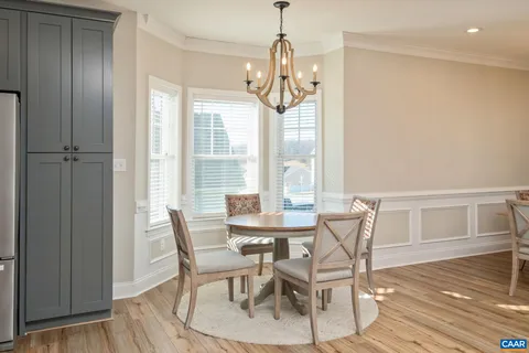 a spacious bedroom with a bed and furniture