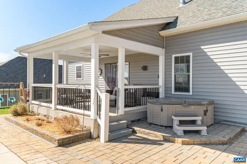 a view of house with outdoor seating space