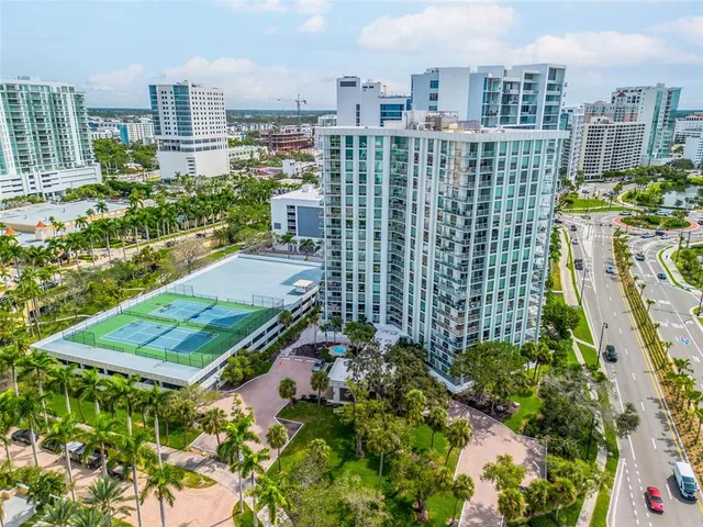 a view of a city with tall buildings