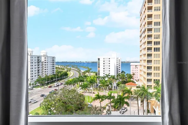 a view of a room with outdoor seating