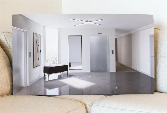 a living room with furniture and a table