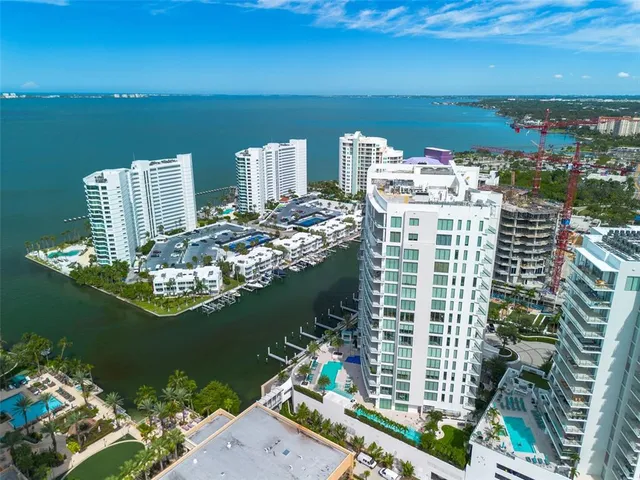 a view of ocean with a multi story building