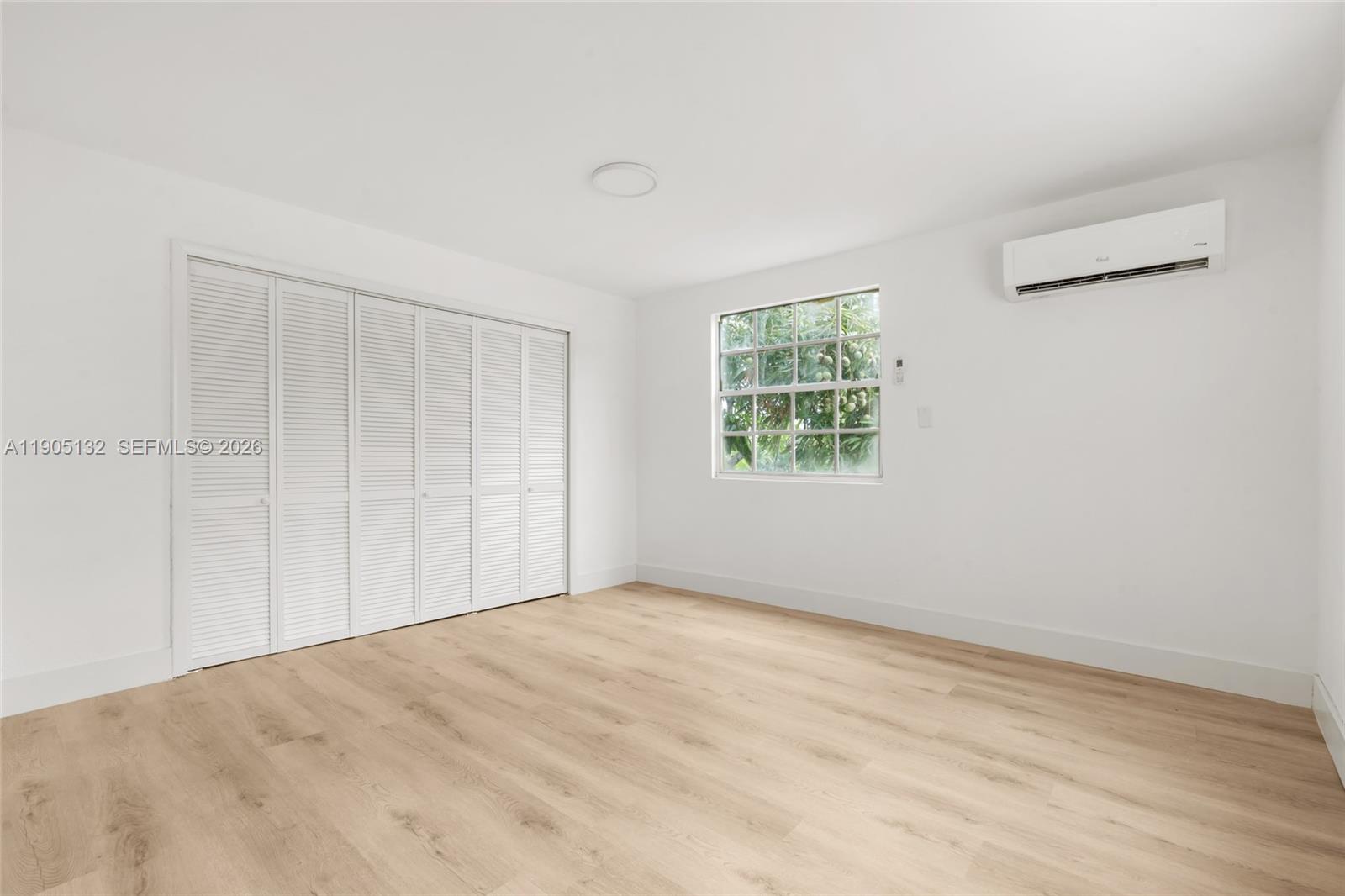 2385 Southwest 17th Street Miami, FL 33145 - Photo 13 of 28 an empty room with windows