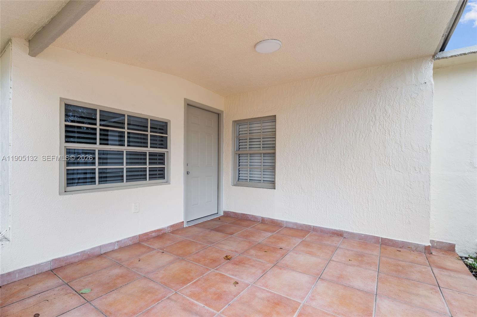 2385 Southwest 17th Street Miami, FL 33145 - Photo 21 of 28 a view of an empty room with a window