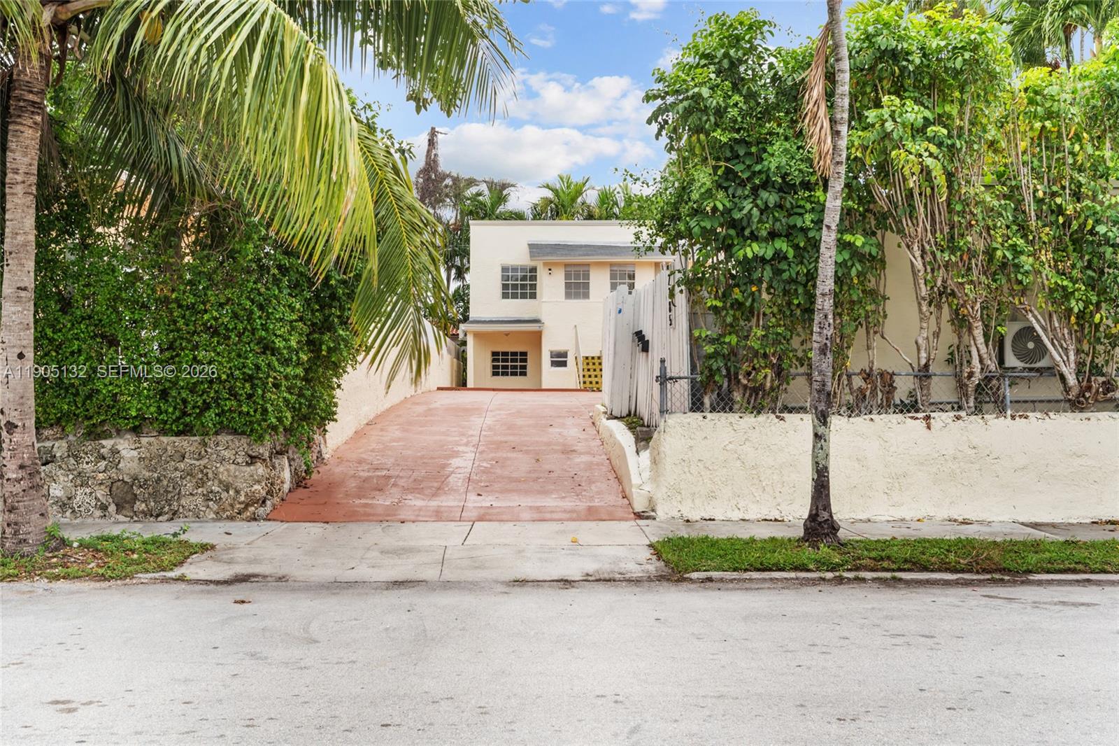 2385 Southwest 17th Street Miami, FL 33145 - Photo 5 of 28 a white house with tree in front of it