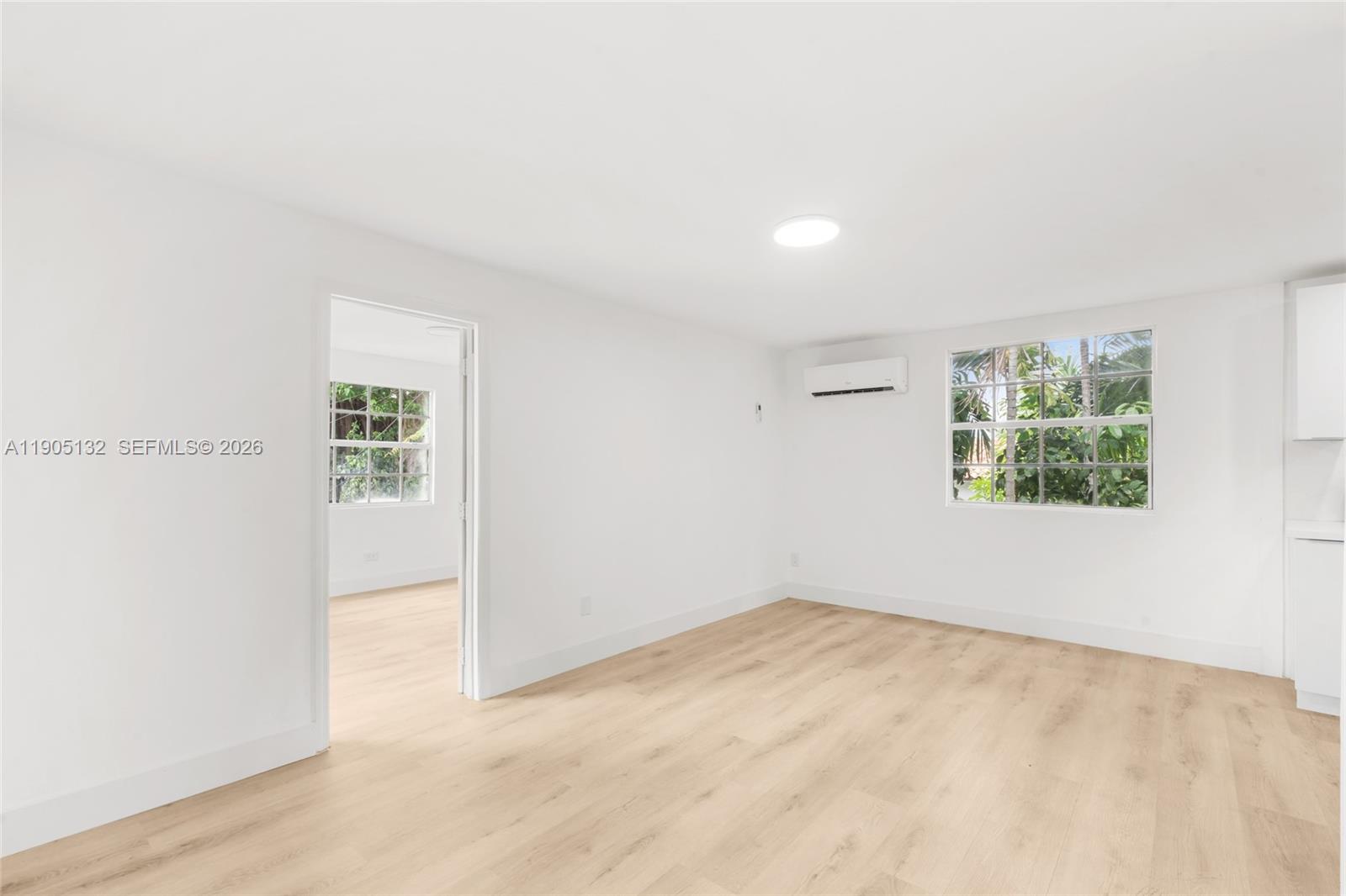 2385 Southwest 17th Street Miami, FL 33145 - Photo 10 of 28 an empty room with windows