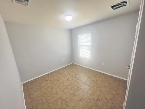 an empty room with a window