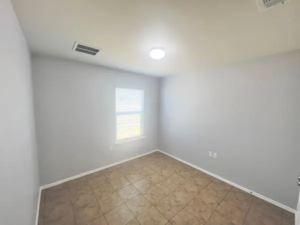 a view of small space with racks on the wall