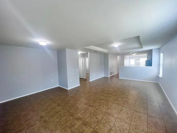 a view of an empty room and window