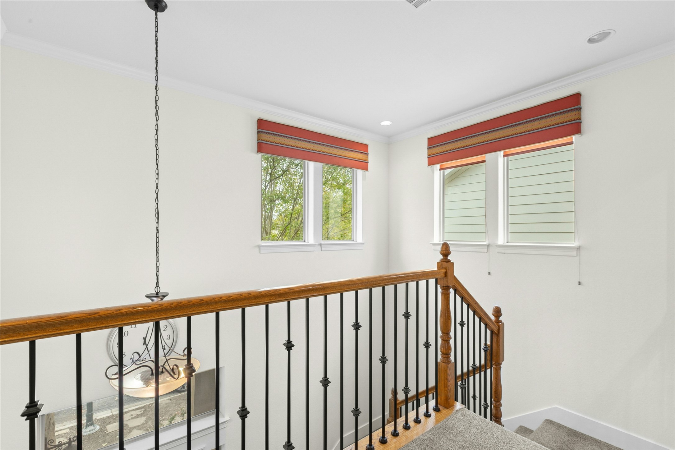 1912 Antone Street Austin, TX 78723 - Photo 20 of 38 Stairs featuring ornamental molding and carpet floors