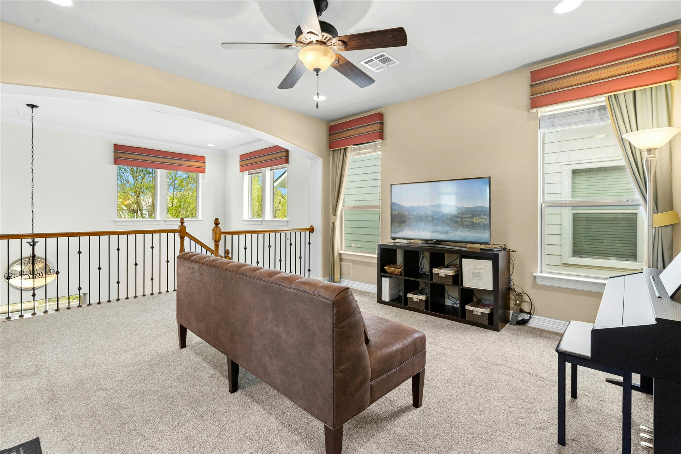 1912 Antone Street Austin, TX 78723 - Photo 21 of 38 Family Room with carpet, a ceiling fan, and recessed lighting