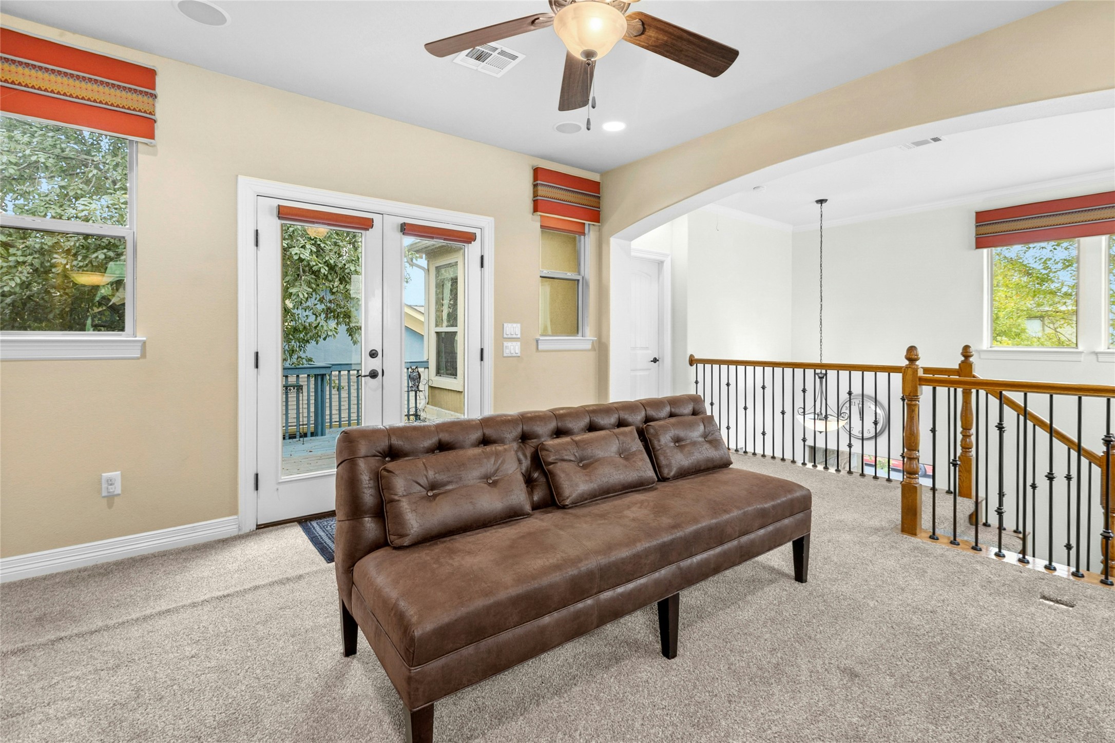 1912 Antone Street Austin, TX 78723 - Photo 22 of 38 Family Room with carpet, a ceiling fan, and recessed lighting