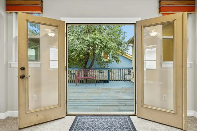 a view of a porch with a door