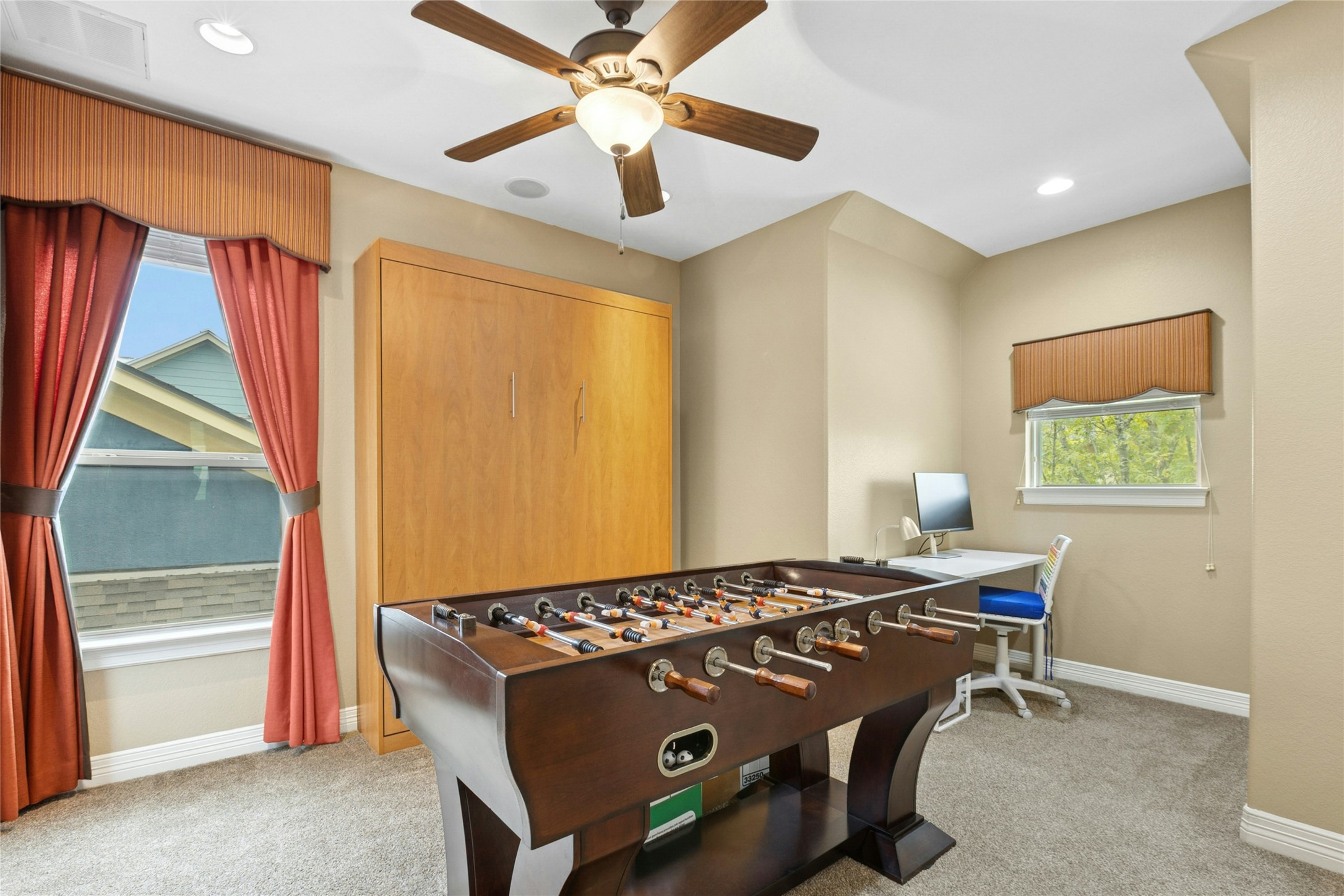 1912 Antone Street Austin, TX 78723 - Photo 27 of 38 Rec room with light carpet, recessed lighting, an office area, and ceiling fan. Optional bedroom 3