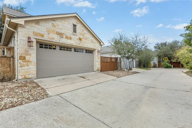 a view of a house with a garage