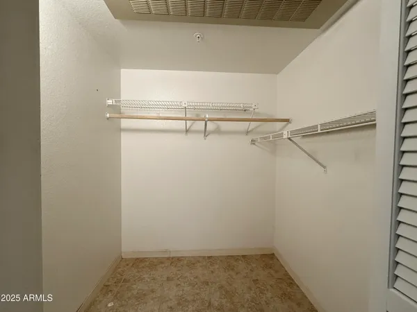 a view of a room with racks on the wall