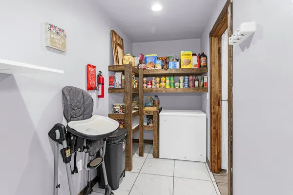 a room with storage and utility