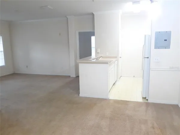 a view of kitchen and utility room