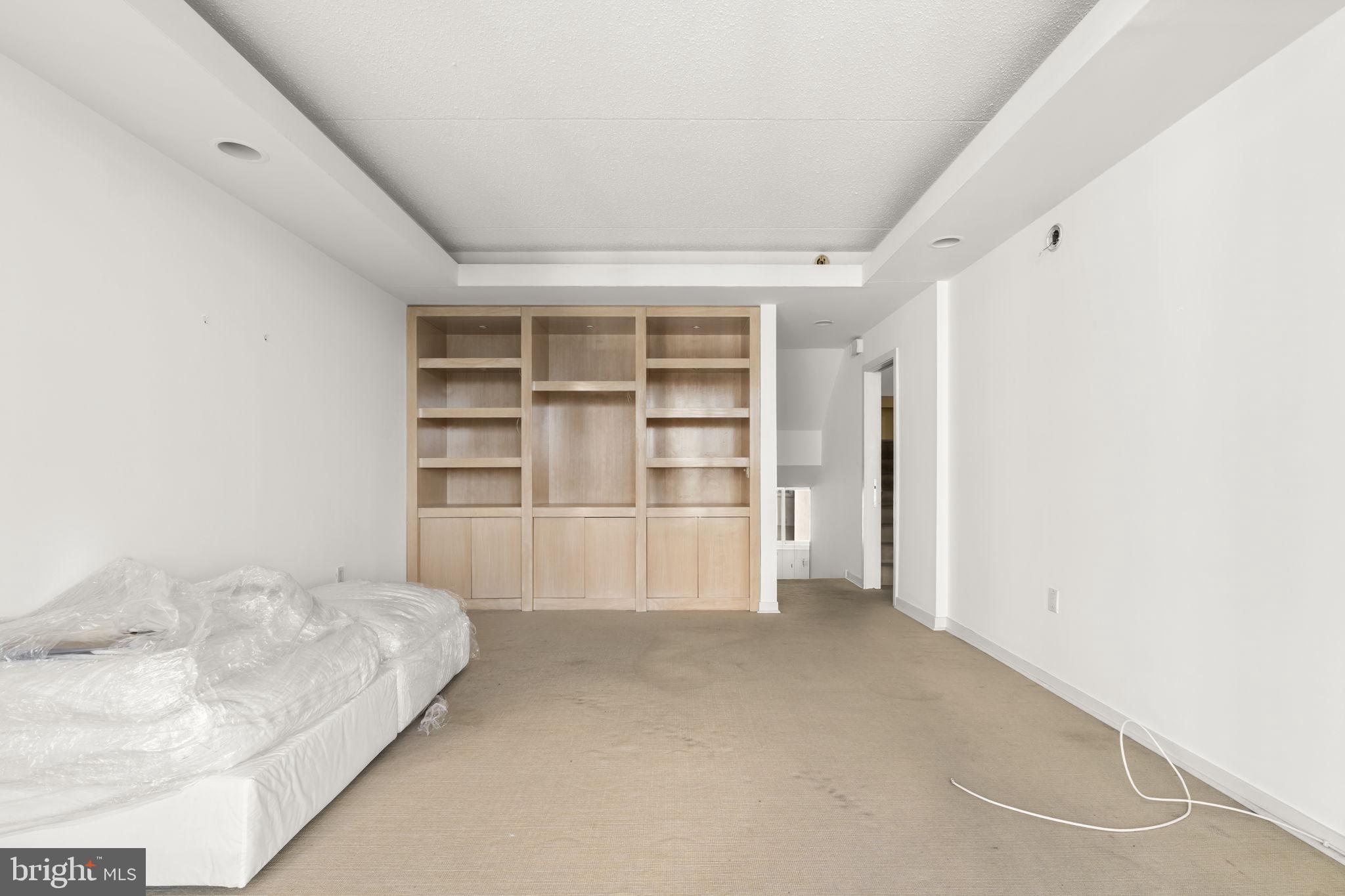 2301 Cherry Street, Unit 5F Philadelphia, PA 19103 - Photo 12 of 26 a room with a bed and closet