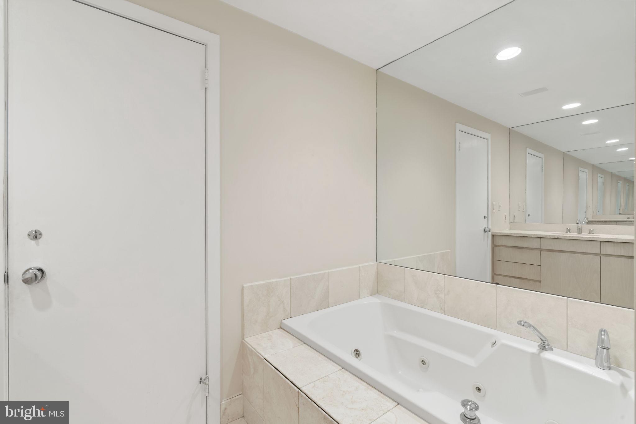 2301 Cherry Street, Unit 5F Philadelphia, PA 19103 - Photo 16 of 26 a bathroom with a bathtub and a sink