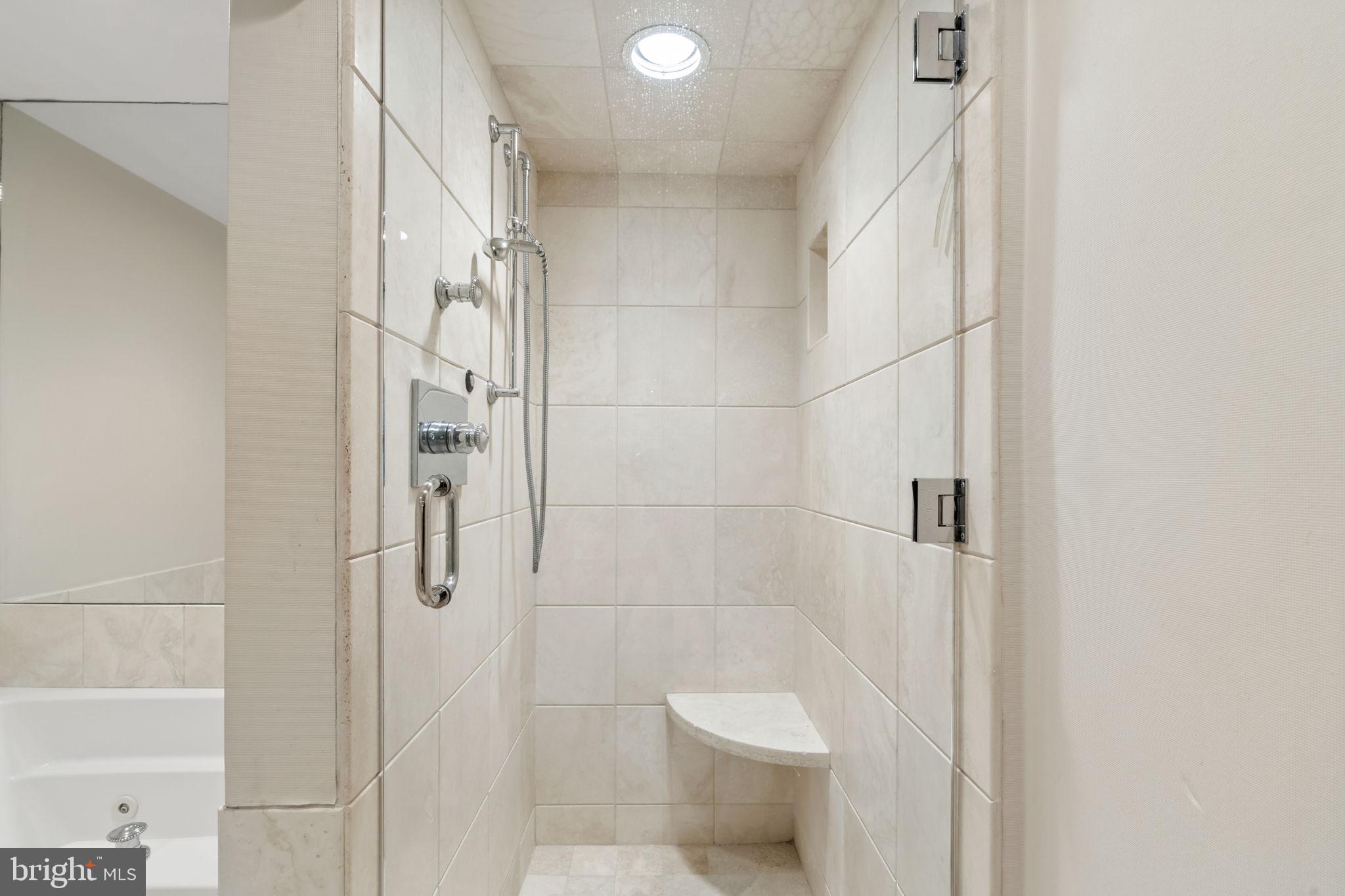 2301 Cherry Street, Unit 5F Philadelphia, PA 19103 - Photo 17 of 26 a bathroom with a toilet and shower