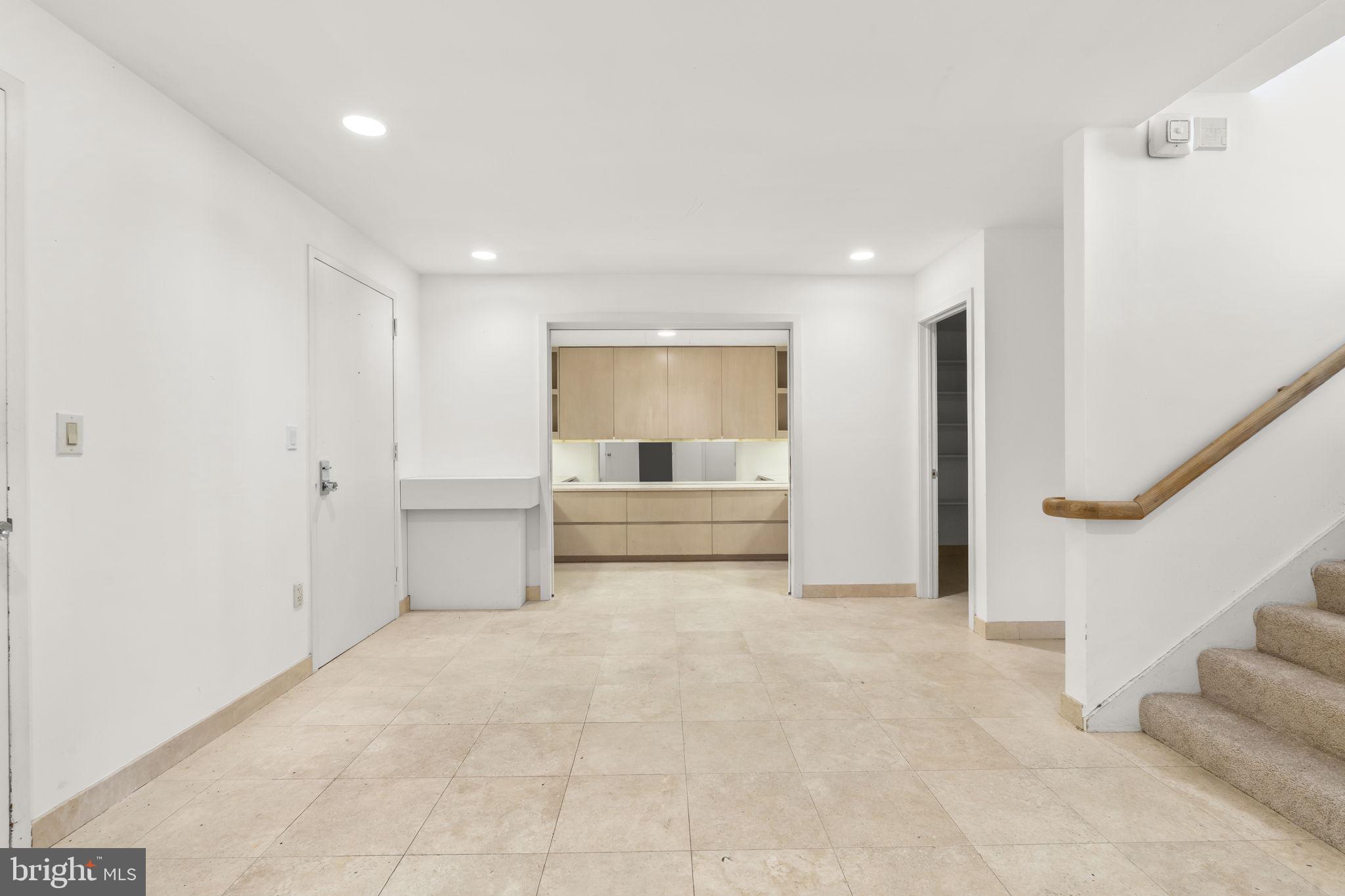 2301 Cherry Street, Unit 5F Philadelphia, PA 19103 - Photo 5 of 26 a view of an empty room with a window