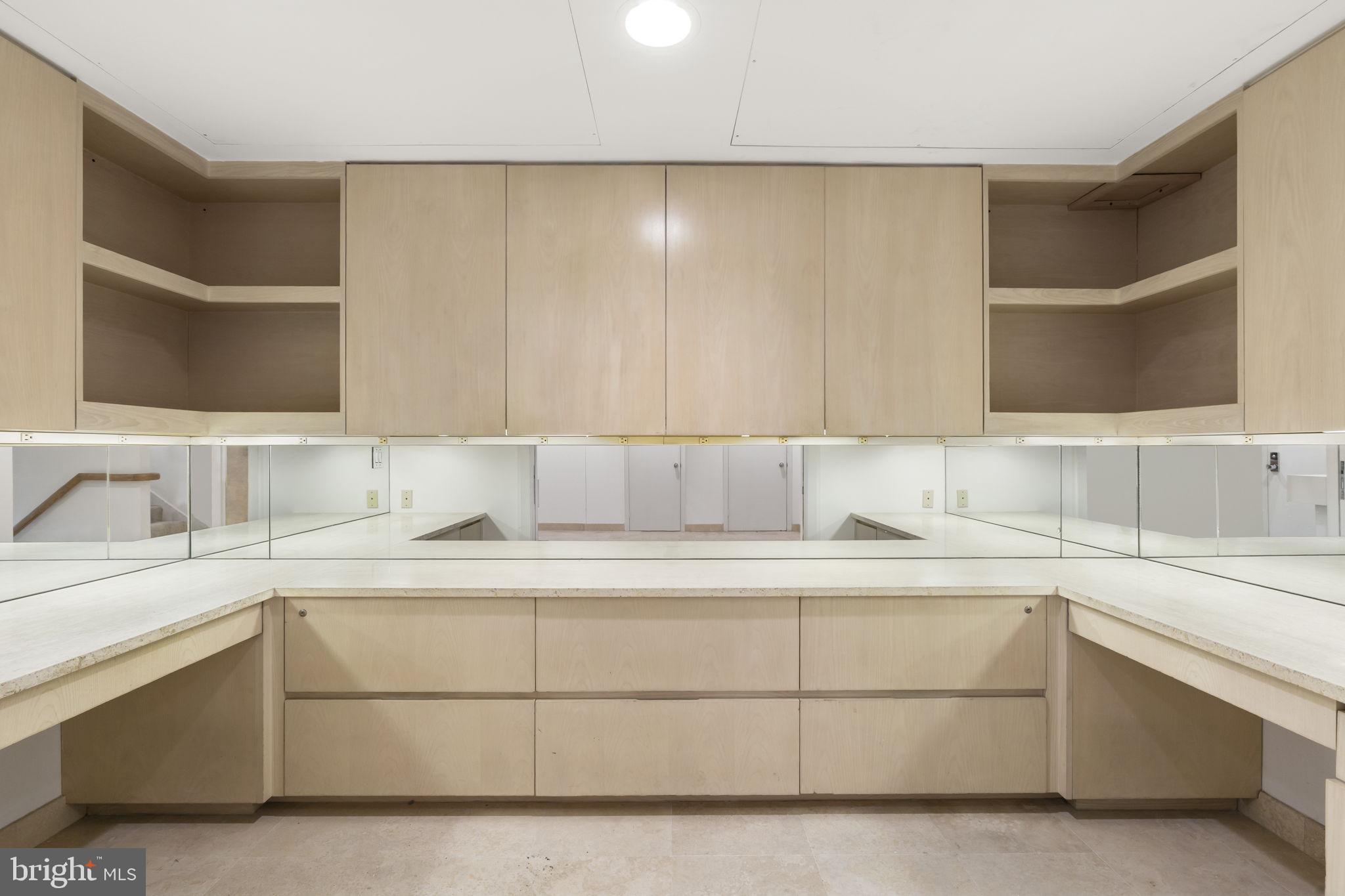 2301 Cherry Street, Unit 5F Philadelphia, PA 19103 - Photo 6 of 26 a kitchen with a sink and cabinets